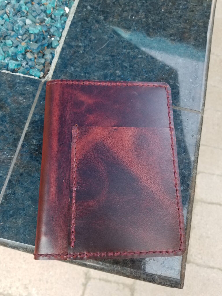 A6 Makers South leather notebook in Cayenne Santa Fe, bordeaux thread. 